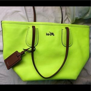 Neon yellow taxi coach shoulder tote